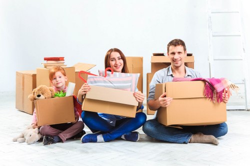 Student removals van loading boxes outside a Watford home