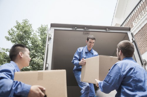 Removal van parked for a house move in a Watford residential street