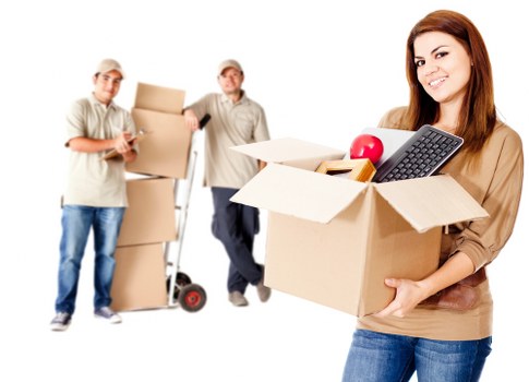 Commercial office relocation equipment and desks being moved in Watford