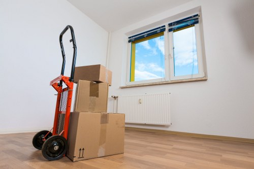 Packed student belongings ready for transport in Watford