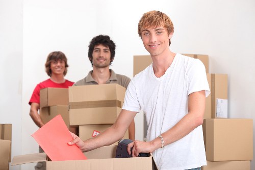 Packed boxes and furniture ready for house removals in Watford