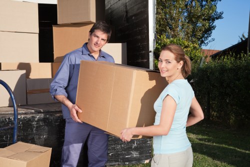 Careful packing and furniture loading for a house move in Watford