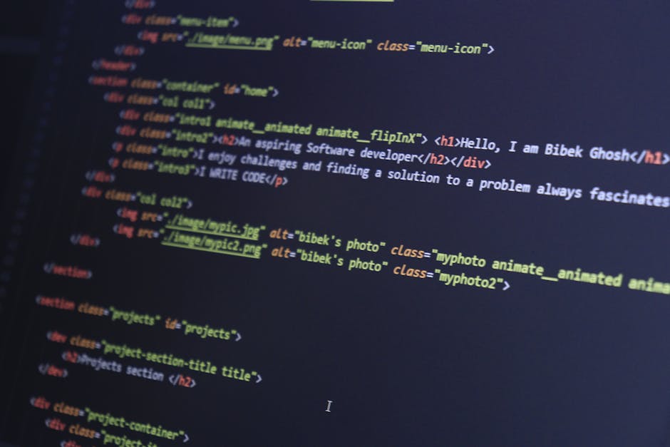 A close-up view of a computer screen displaying lines of code written in HTML, featuring coloured tags and attributes. The code includes image file references with filenames such as 'bibek's photo' an